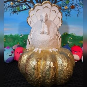 Gold and White Turkey Figurine on Pumpkin